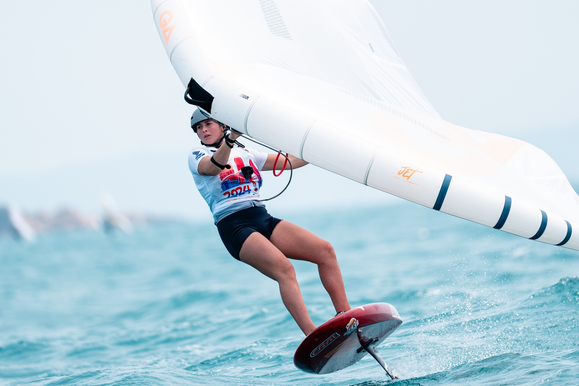Maddalena Spanu wins Asian Championship while Federico Pilloni clinches second leg of iQFOiL Youth Italian Cup - News - Yacht Club Costa Smeralda